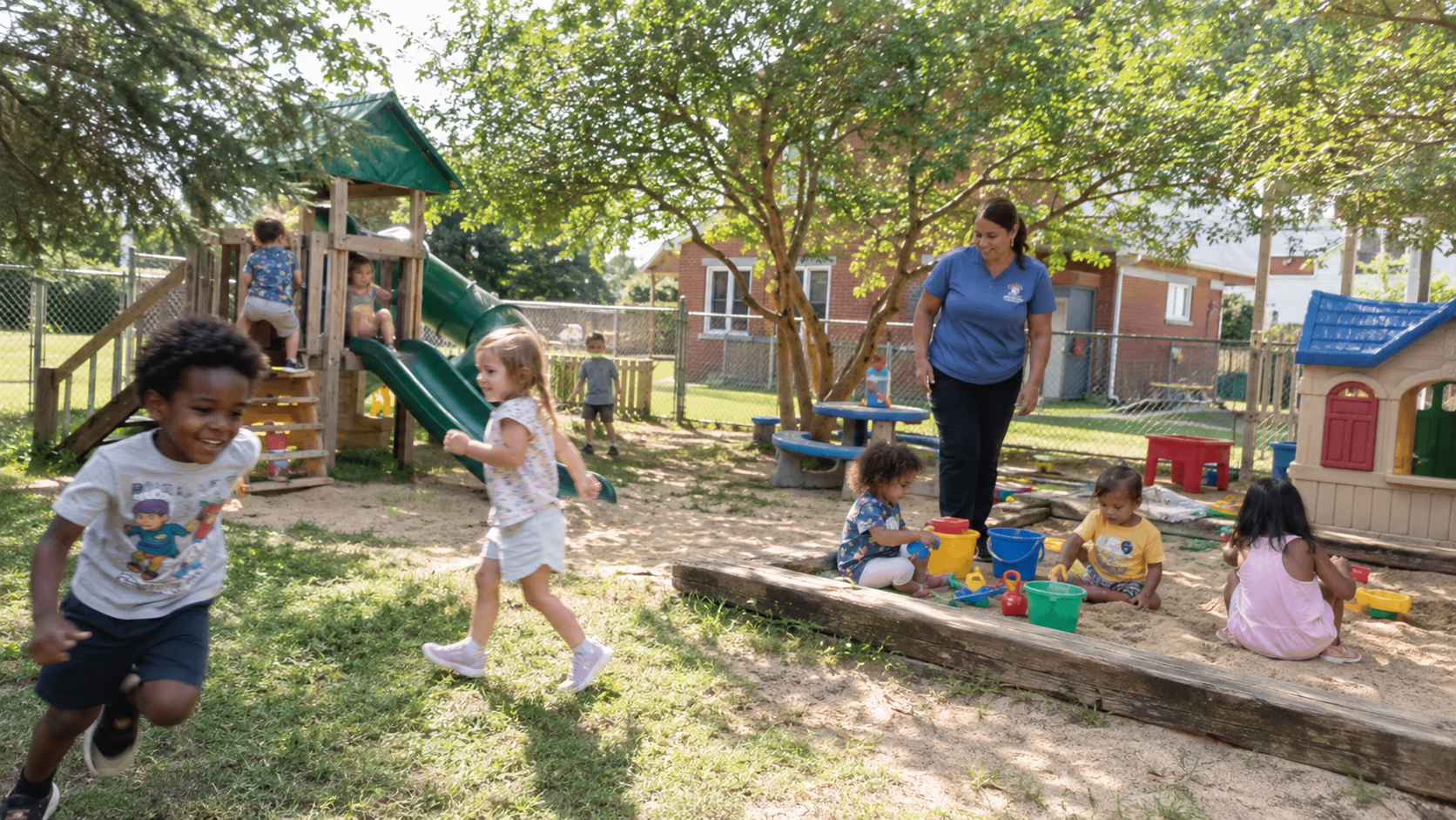 Children playing outdoors at Kids Paradise Daycare